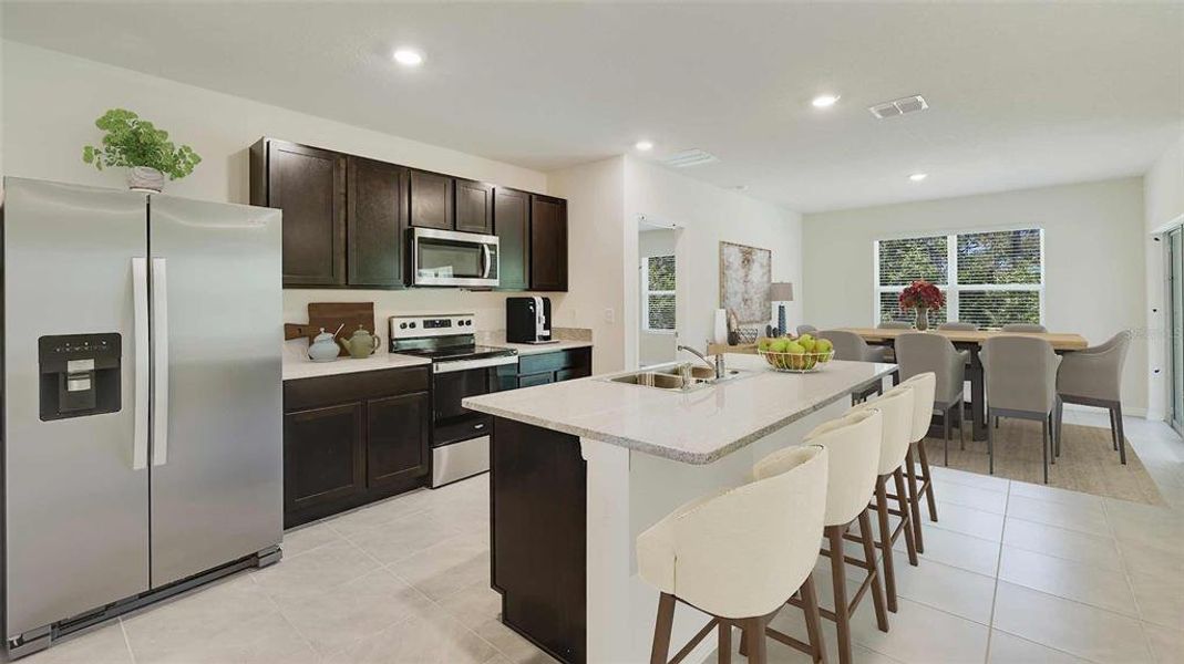 Furnished interior view inside a new home in Triumph South, Wildwood (Image 4).