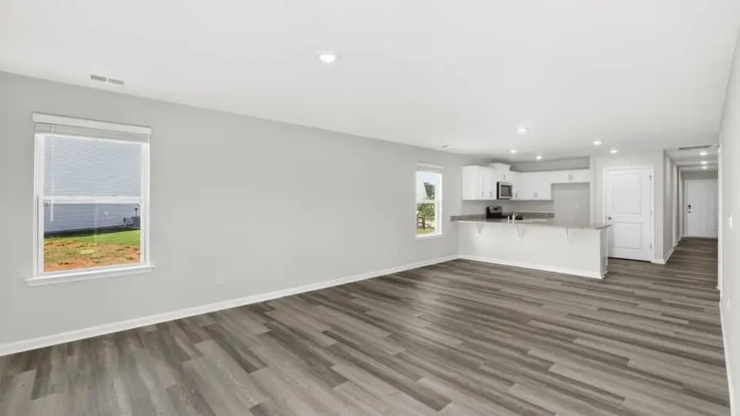 Spacious, unfurnished interior of a new home in Village Grove, Greenville (Image 27).