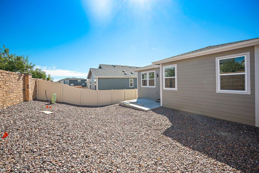 Exterior details and patio area of a home in Trails at Aspen Ridge-3, Colorado Springs (Image 16).