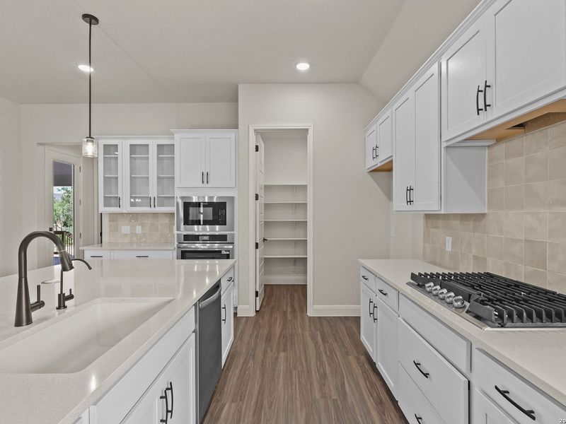 Furnished interior view inside a new home in Potranco Oaks, Castroville (Image 9).