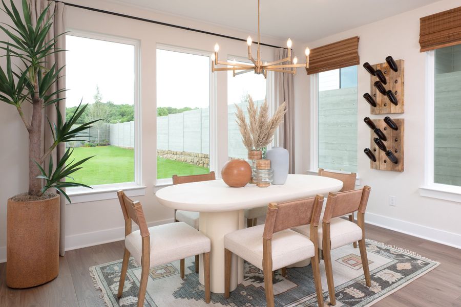 Representative furnished interior of a home built from the Magnolia by Tri Pointe Homes in Landmark, Denton (Image 11).