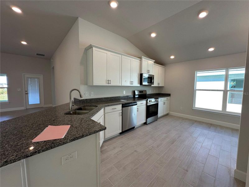 Furnished interior view inside a new home in Densan Park, Wildwood (Image 4).