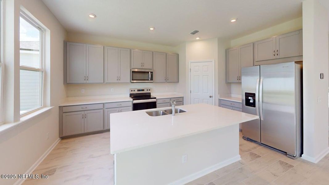 Furnished interior view inside a new home in Sandridge Hills, Green Cove Springs (Image 5).