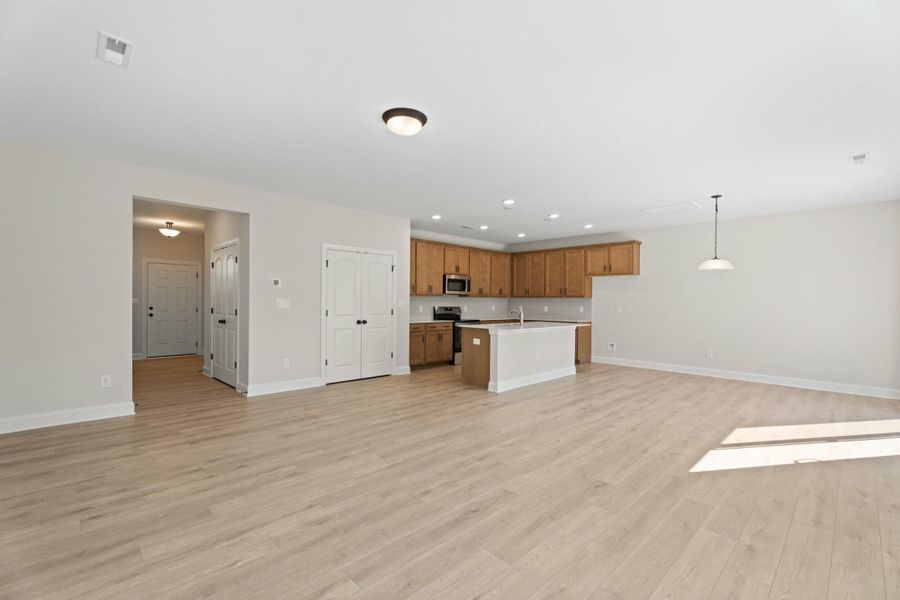 Spacious, unfurnished interior of a new home in Cottages at Piper Village, Trinity (Image 13).