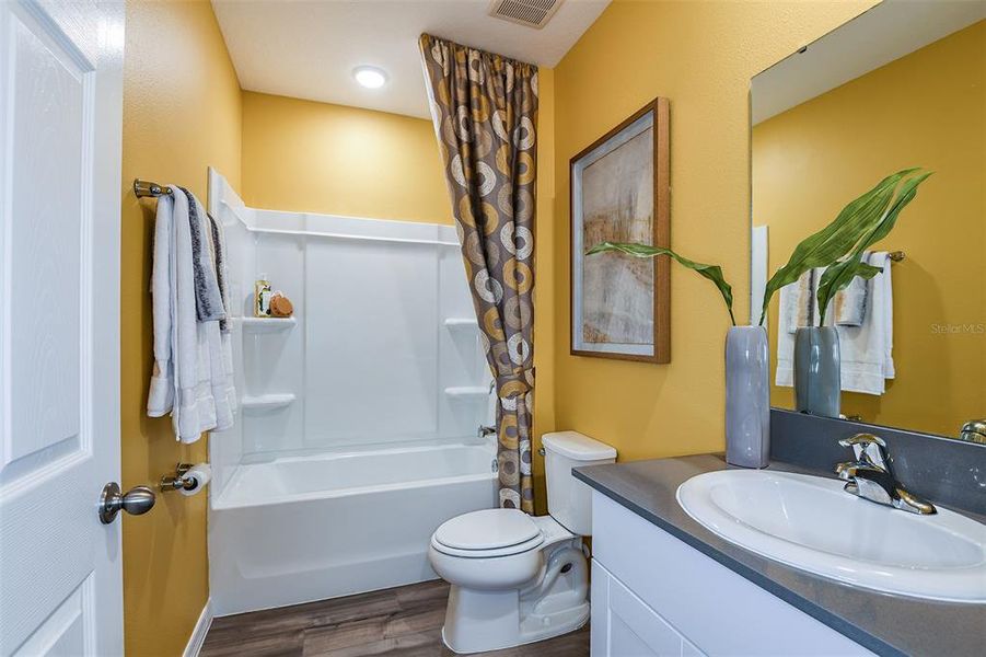 Furnished interior view inside a new home in Scenic Terrace, Haines City (Image 13).