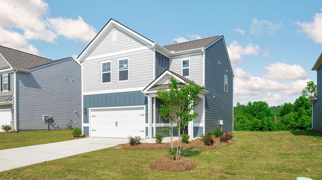 Front exterior of a new home in Fairview Hills, Cleveland, TN, highlighting curb appeal (Image 20). Front exterior of a new home in Fairview Hills, Cleveland, TN, highlighting curb appeal (Image 20).