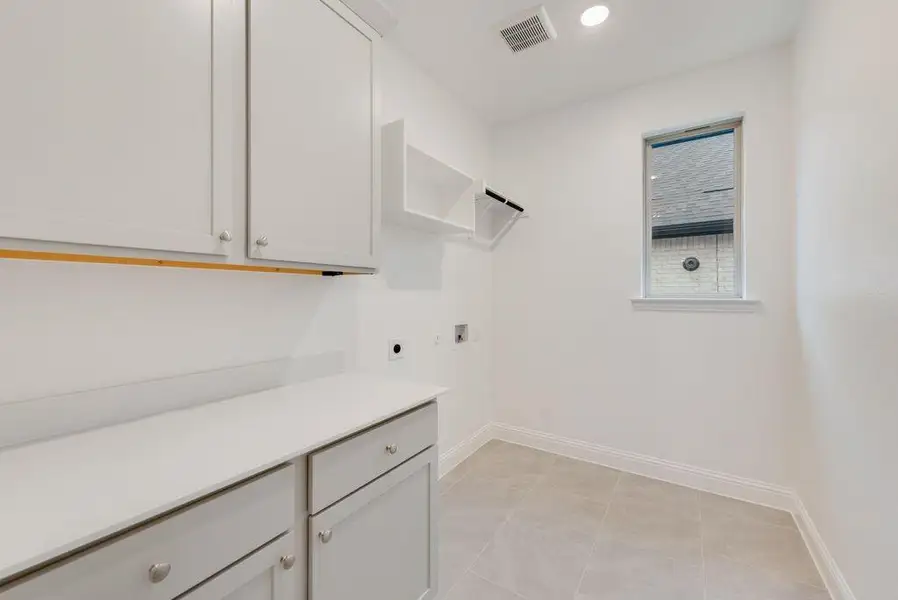Furnished interior view inside a new home in Valencia On The Lake, Little Elm (Image 9).