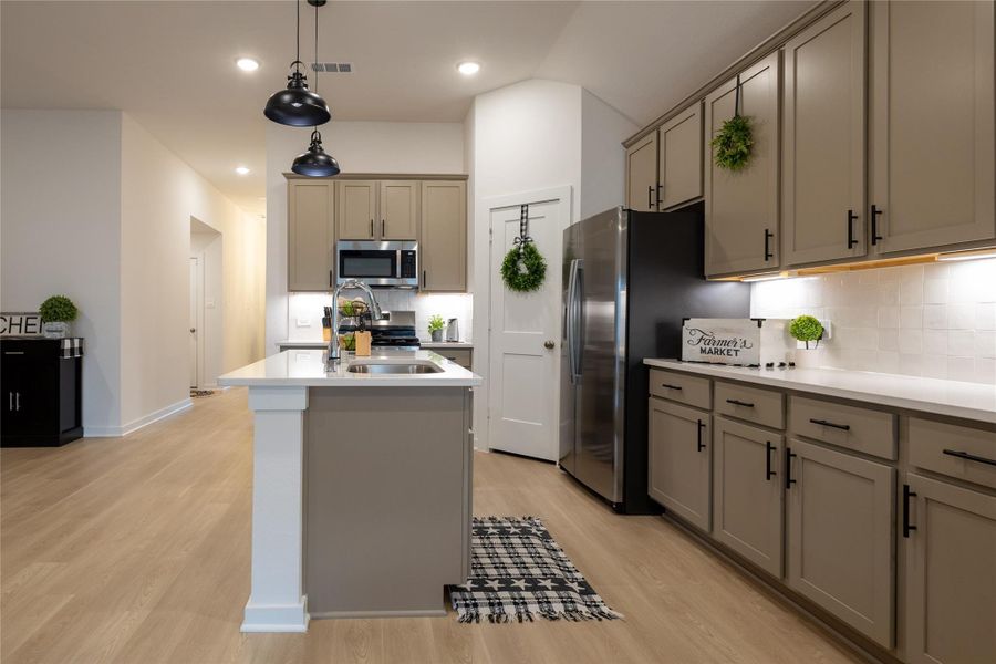 Furnished interior view inside a new home in Pinewood at Grand Texas, New Caney (Image 13).