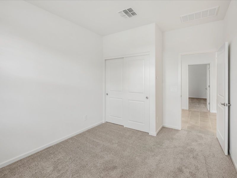 Spacious, unfurnished interior of a new home in Las Patrias at Star Valley Phase III - Premier Series, Tucson (Image 13).
