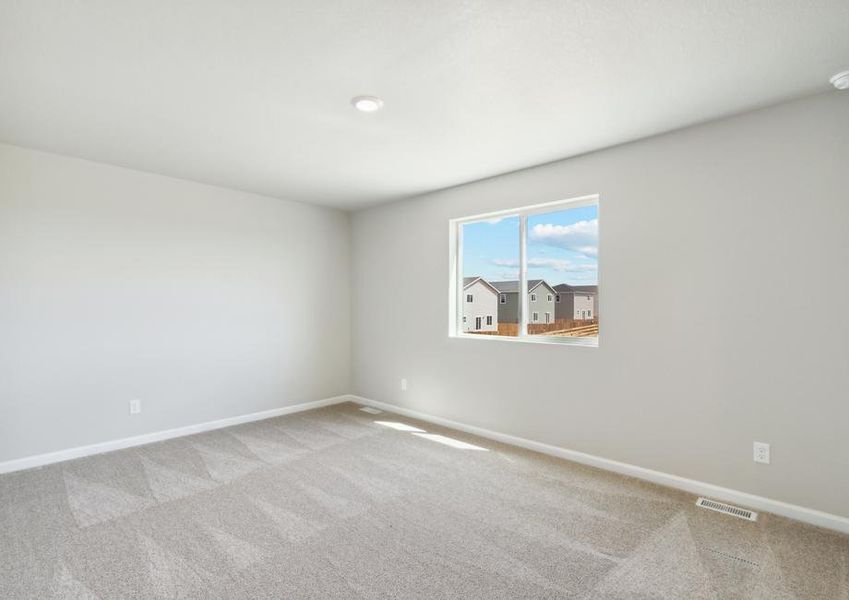 The master bedroom of the Laramie is large.