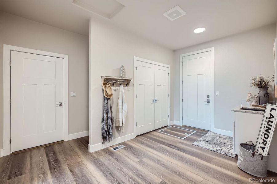 Utility Room entry from Garage and back Porch.