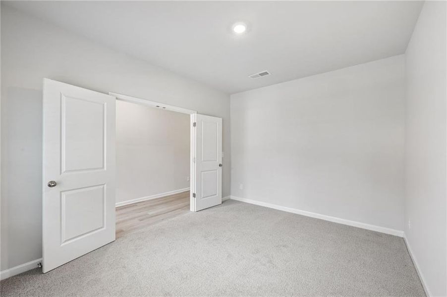 Spacious, unfurnished interior of a new home in Westmont Preserve, Powder Springs (Image 39).