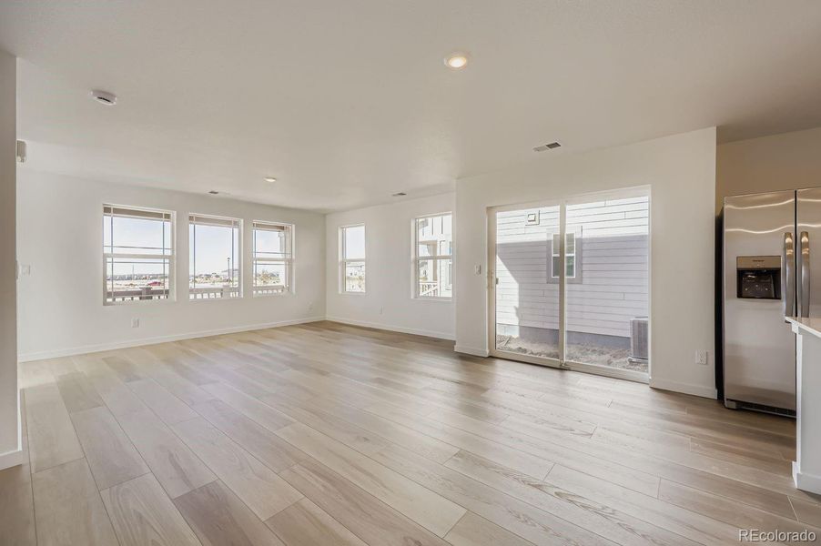 Spacious, unfurnished interior of a new home in Percheron: The Explorer Collection, Colorado Springs (Image 10).
