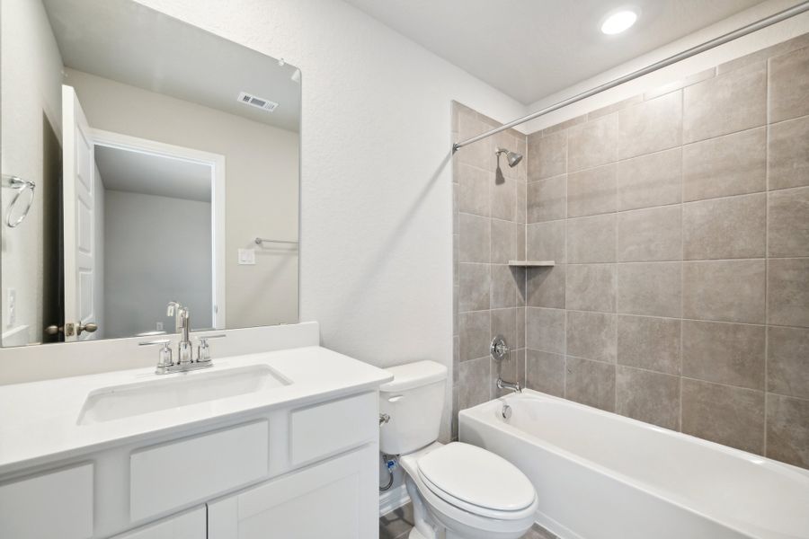 Guest bathroom in the Reynolds floorplan at a Meritage Homes community.