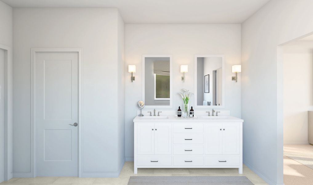 Primary bath with freestanding vanity and white-framed mirrors