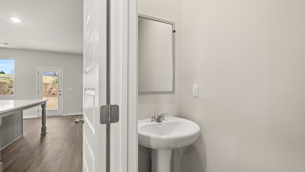 Representative furnished interior of a home built from the ANSLEY Express by D.R. Horton in WillowBrook, Winder (Image 11).