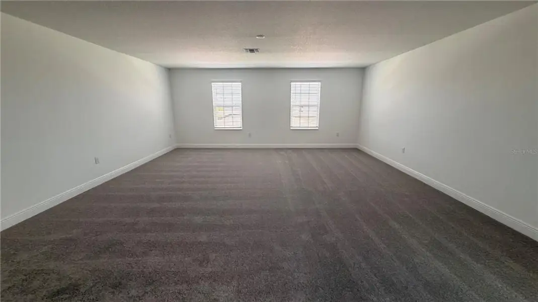 Spacious, unfurnished interior of a new home in Bargrove Estates, Mount Dora (Image 8). Spacious, unfurnished interior of a new home in Bargrove Estates, Mount Dora (Image 8).