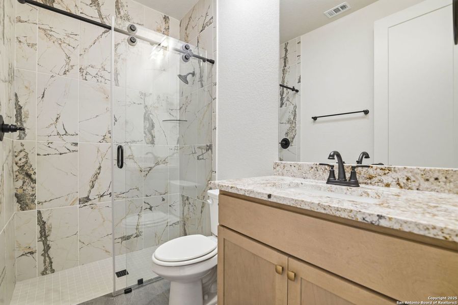 Furnished interior view inside a new home in Ventana - 60', Bulverde (Image 6).