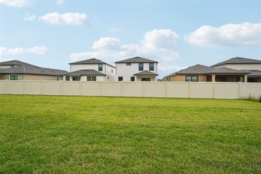 Exterior details and patio area of a home in Grasslands West, Lakeland (Image 4).