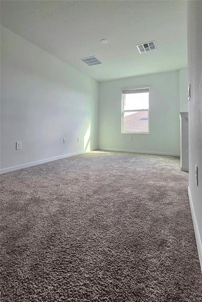 Spacious, unfurnished interior of a new home in Peace Creek Reserve, Winter Haven (Image 7).