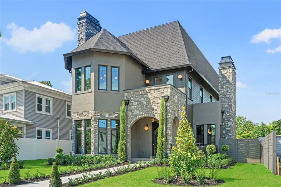 Front exterior of a new home in , Tampa, FL, highlighting curb appeal (Image 28).