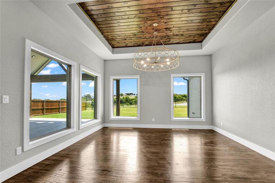 Bathroom with a wealth of natural light, tile flooring, and vanity