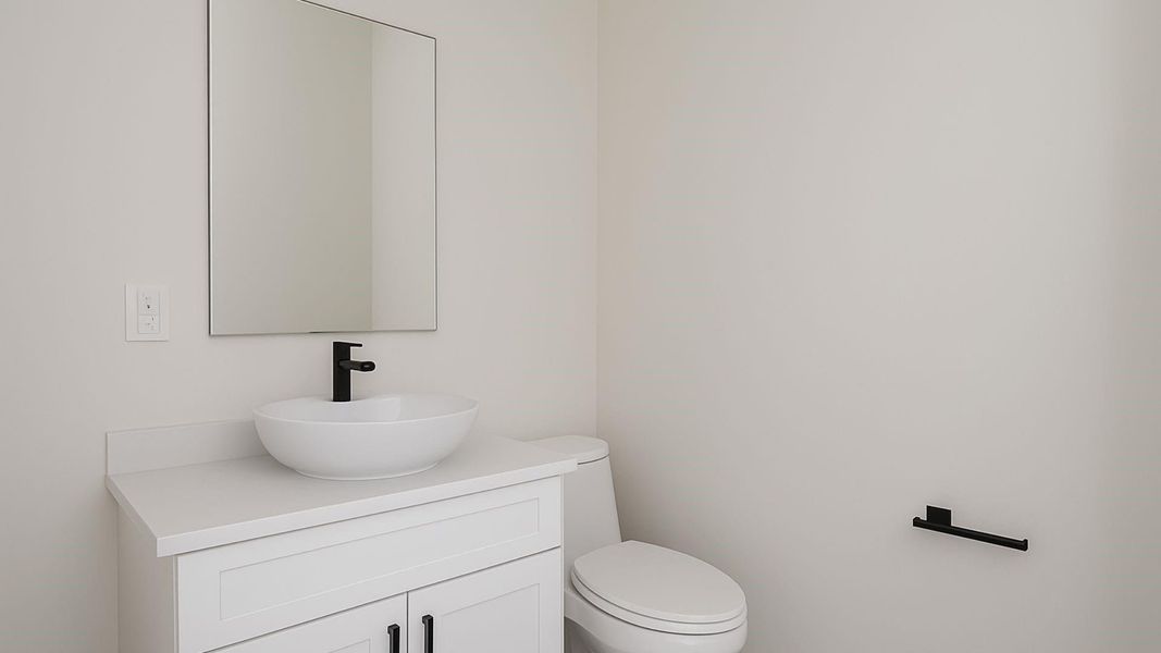 this is a rendering of the half bathroom