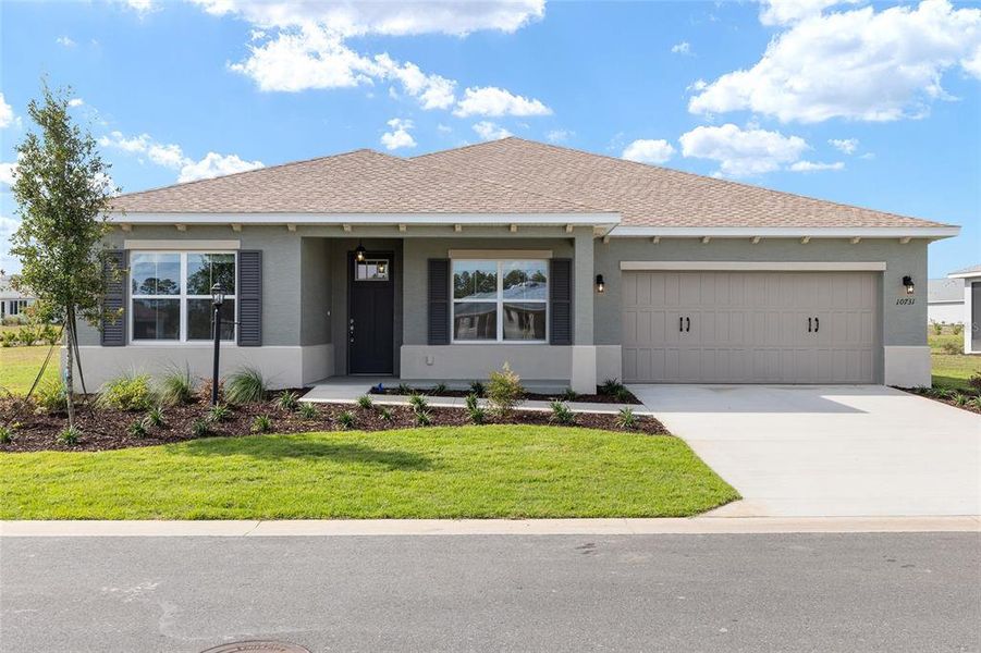 Front exterior of a new home in , Ocala, FL, highlighting curb appeal (Image 19).