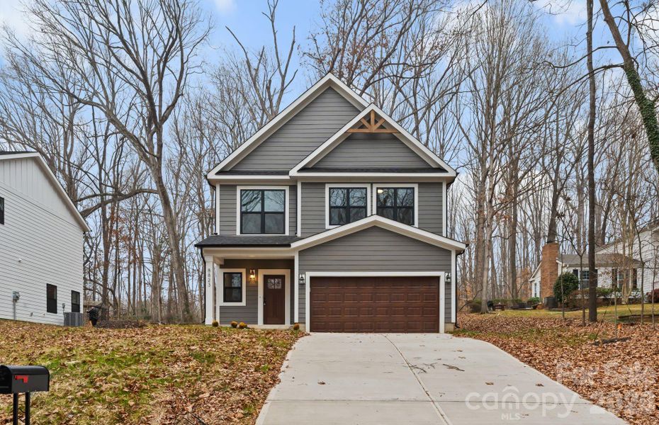 Front exterior of a new home in , Charlotte, NC, highlighting curb appeal (Image 19).