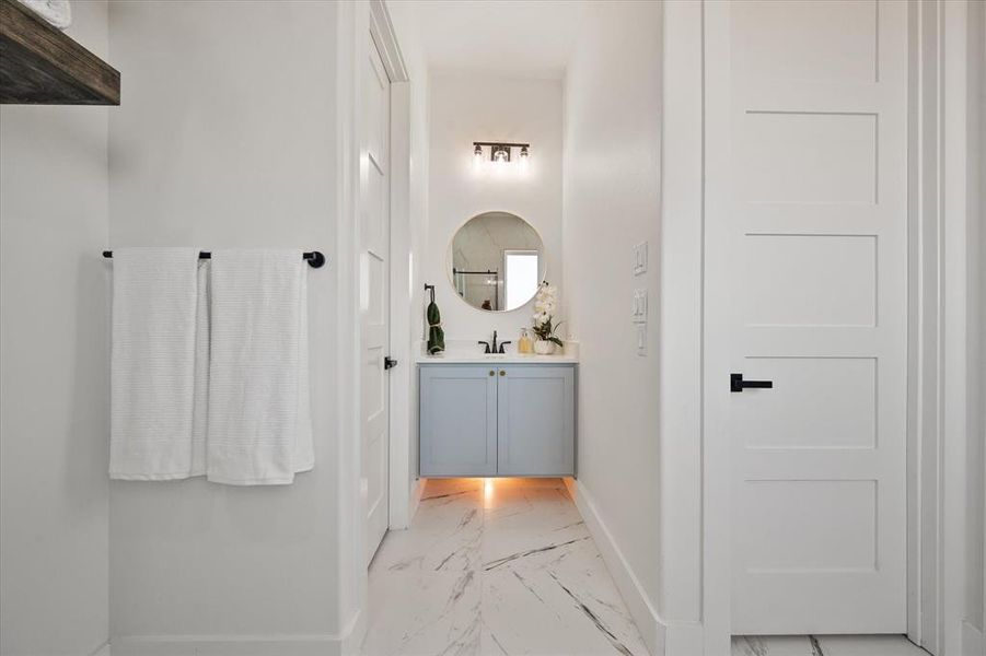 Bathroom with floating cabinets