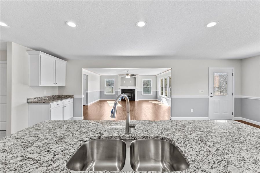 Representative furnished interior of a home built from the Emilia by Enchanted Homes in Guadalupe Heights, Seguin (Image 9).