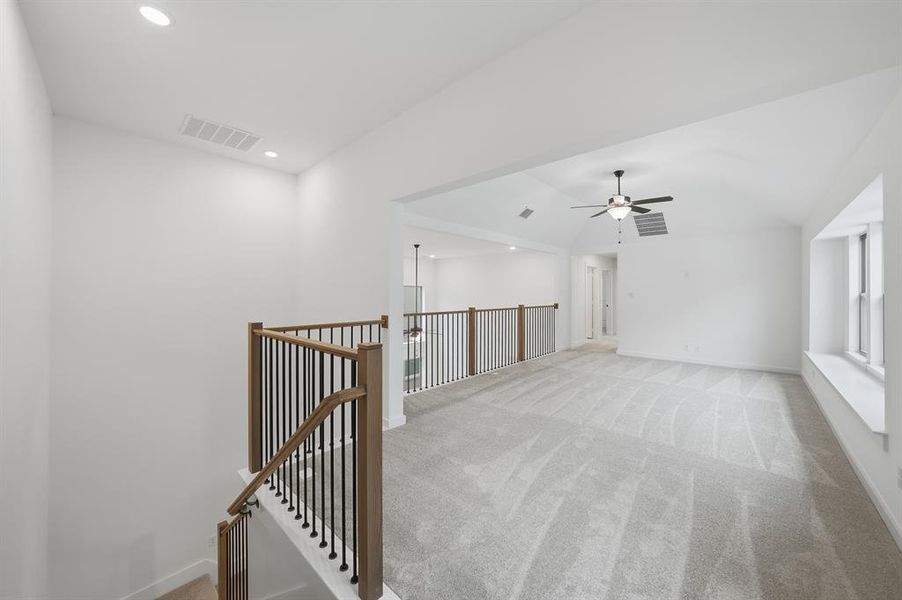 Unfurnished room with light colored carpet, recessed lighting, and ceiling fan
