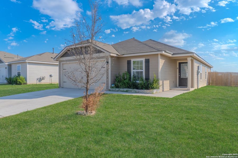 Front exterior of a new home in Luckey Ranch, San Antonio, TX, highlighting curb appeal (Image 1).