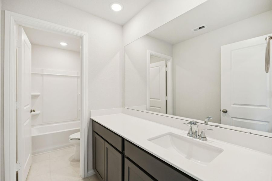 Furnished interior view inside a new home in Saint Tropez, Huffman (Image 6).