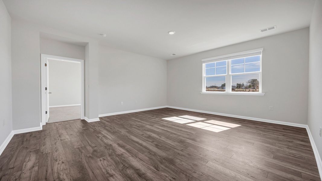 Spacious, unfurnished interior of a new home in Sease's Pond, Gilbert (Image 16).