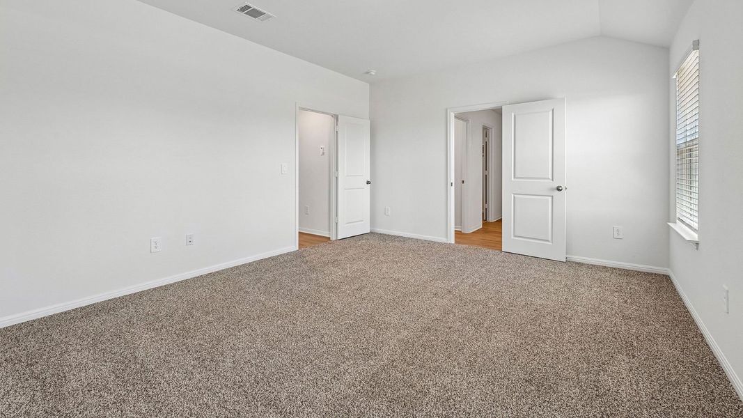 Spacious, unfurnished interior of a new home in Bar W Ranch, Leander (Image 31).
