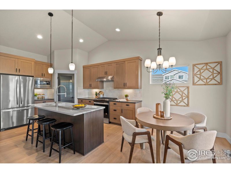 Kitchen with Eating Area and Access to Back Deck