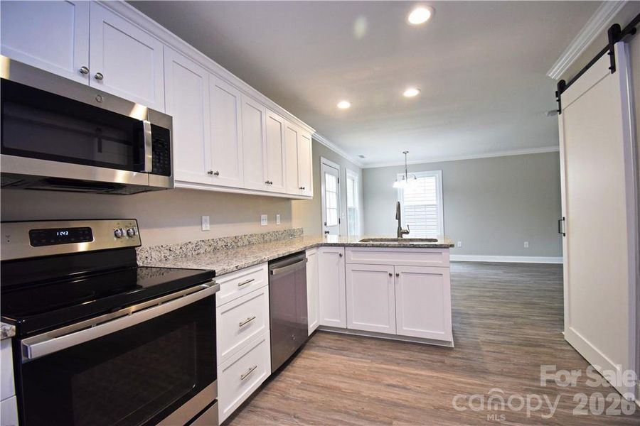 Furnished interior view inside a new home in , Hickory (Image 13).