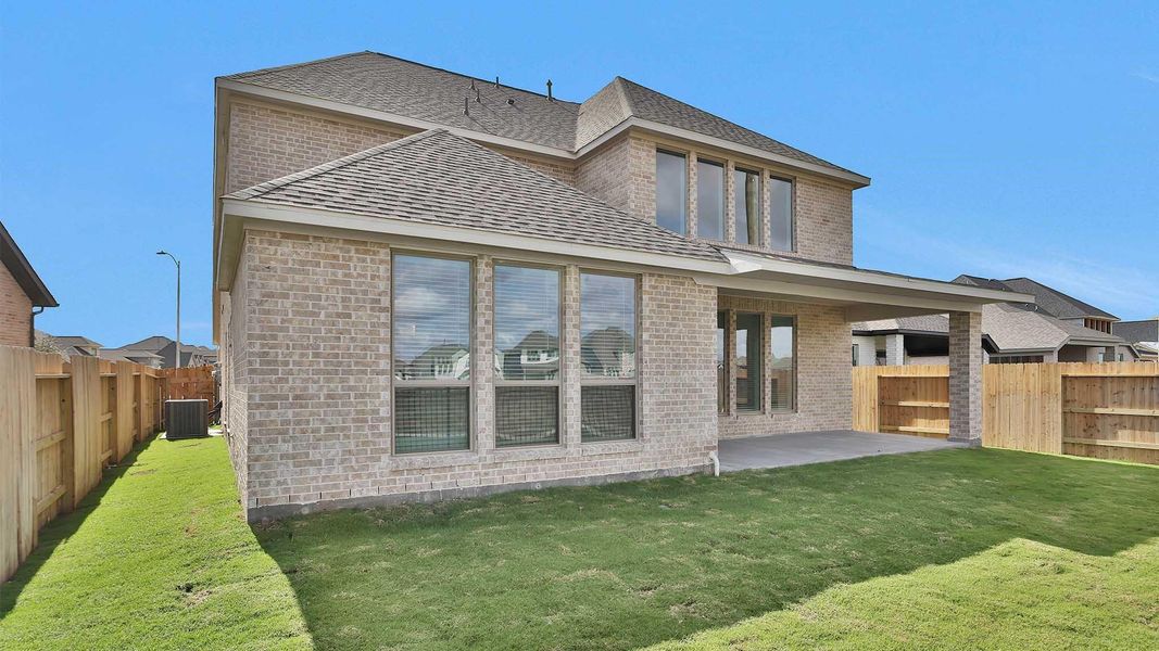 Exterior details and patio area of a home in Stonecreek Estates 50', Richmond (Image 3).