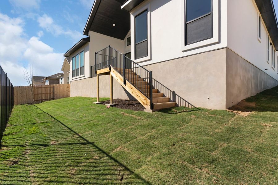 Exterior details and patio area of a home in Lariat, Liberty Hill (Image 4).