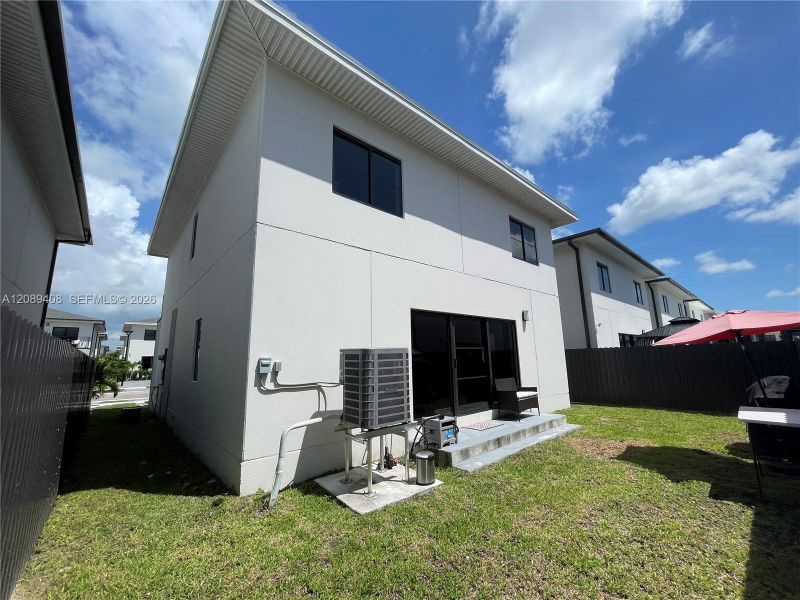 Exterior details and patio area of a home in , Florida City (Image 30).