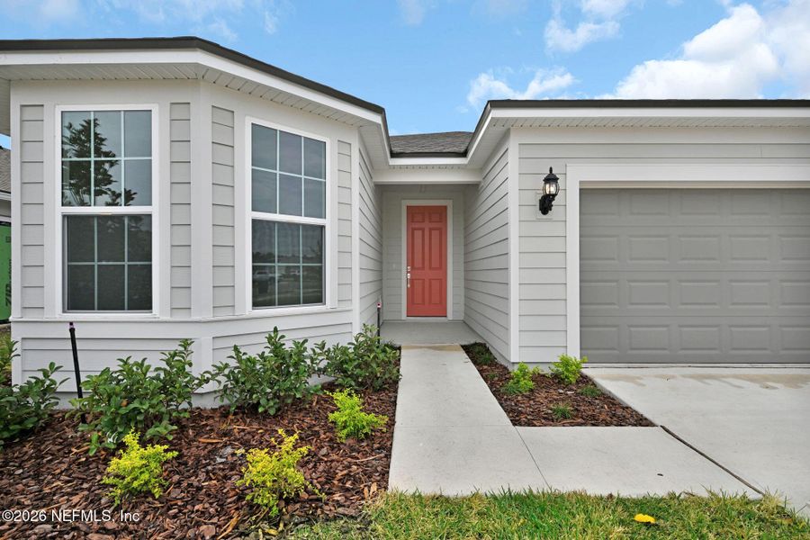 Exterior details and patio area of a home in Summer Bay at Grand Oaks, St. Augustine (Image 3).