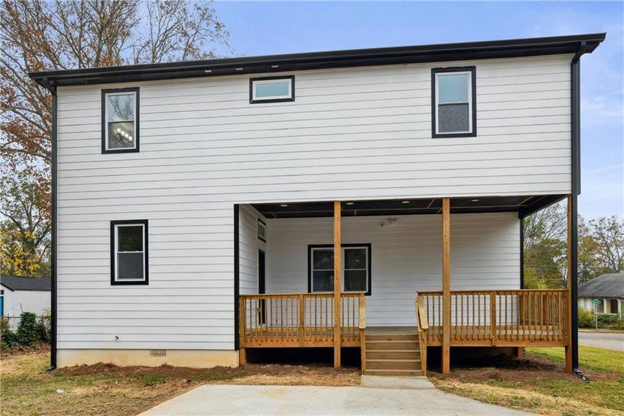 View of front of home featuring a deck