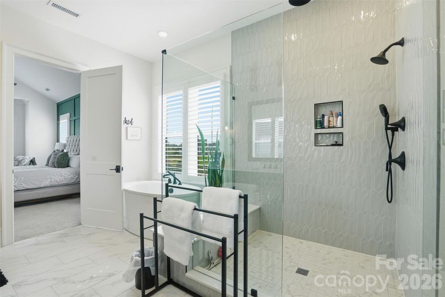 Large shower and freestanding tub
