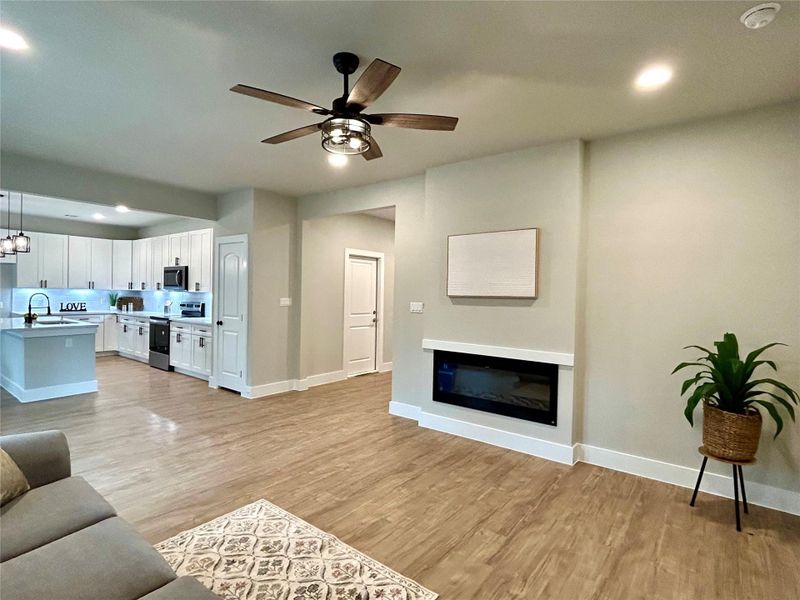 Open concept living, dining, and kitchen areas Open concept living, dining, and kitchen areas