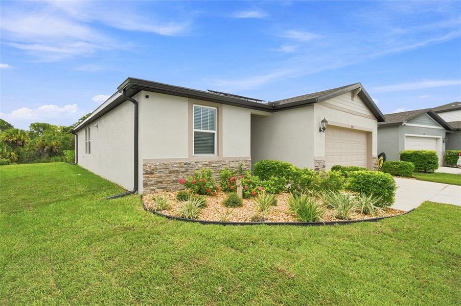 Front exterior of a new home in , Nokomis, FL, highlighting curb appeal (Image 21). Front exterior of a new home in , Nokomis, FL, highlighting curb appeal (Image 21).