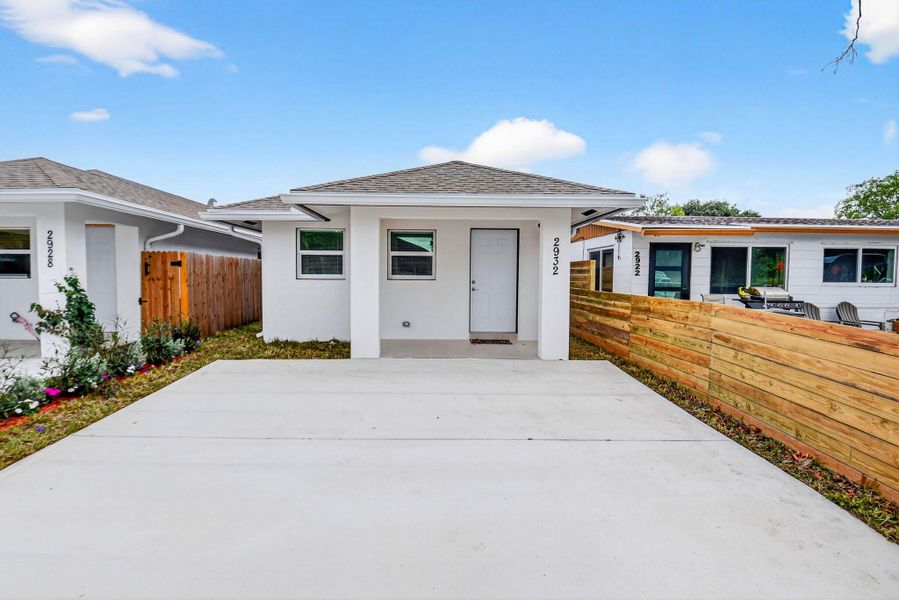 Front exterior of a new home in , West Palm Beach, FL, highlighting curb appeal (Image 1). Front exterior of a new home in , West Palm Beach, FL, highlighting curb appeal (Image 1).