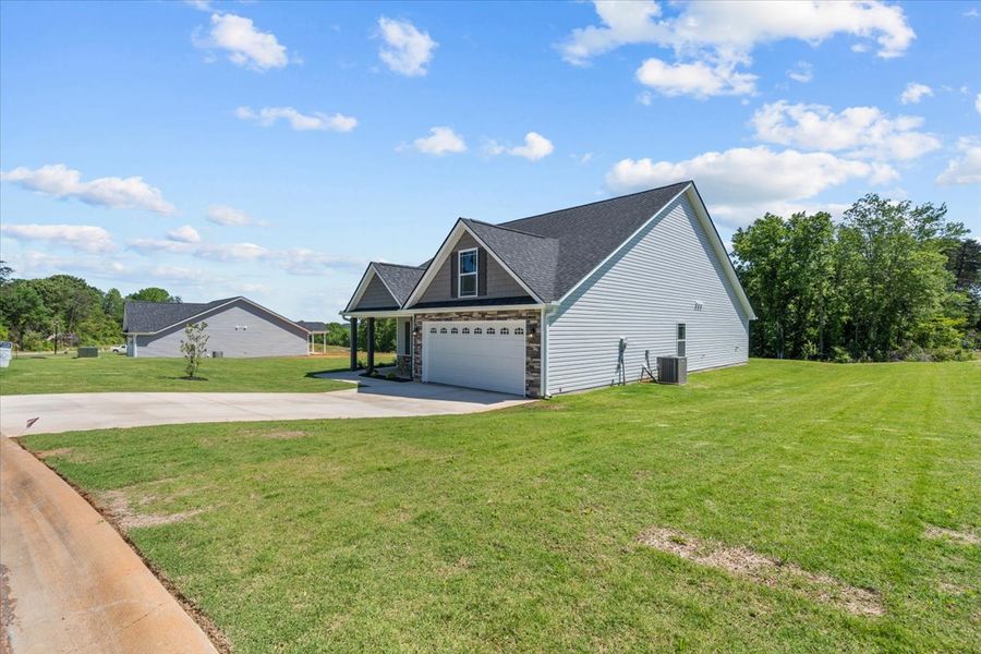 Representative exterior photo of a completed home built from the Fernwood by Enchanted Homes in Guadalupe Heights, Seguin, TX (Image 26).