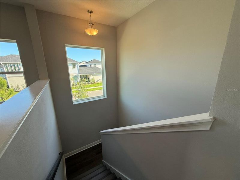 Spacious, unfurnished interior of a new home in Laureate Park, Orlando (Image 14).