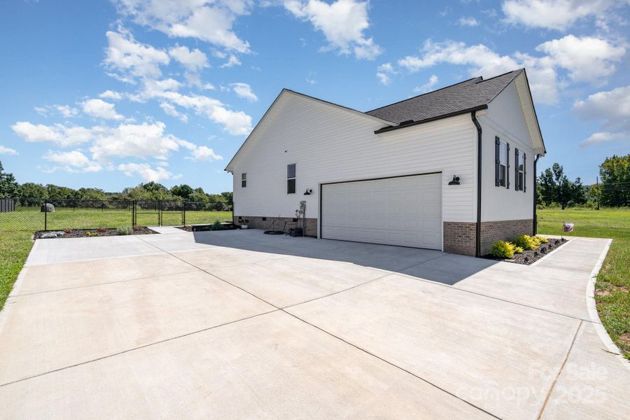 Front exterior of a new home in , Gold Hill, NC, highlighting curb appeal (Image 2). Front exterior of a new home in , Gold Hill, NC, highlighting curb appeal (Image 2).
